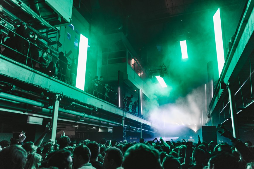 Revelers in the main hall printworks